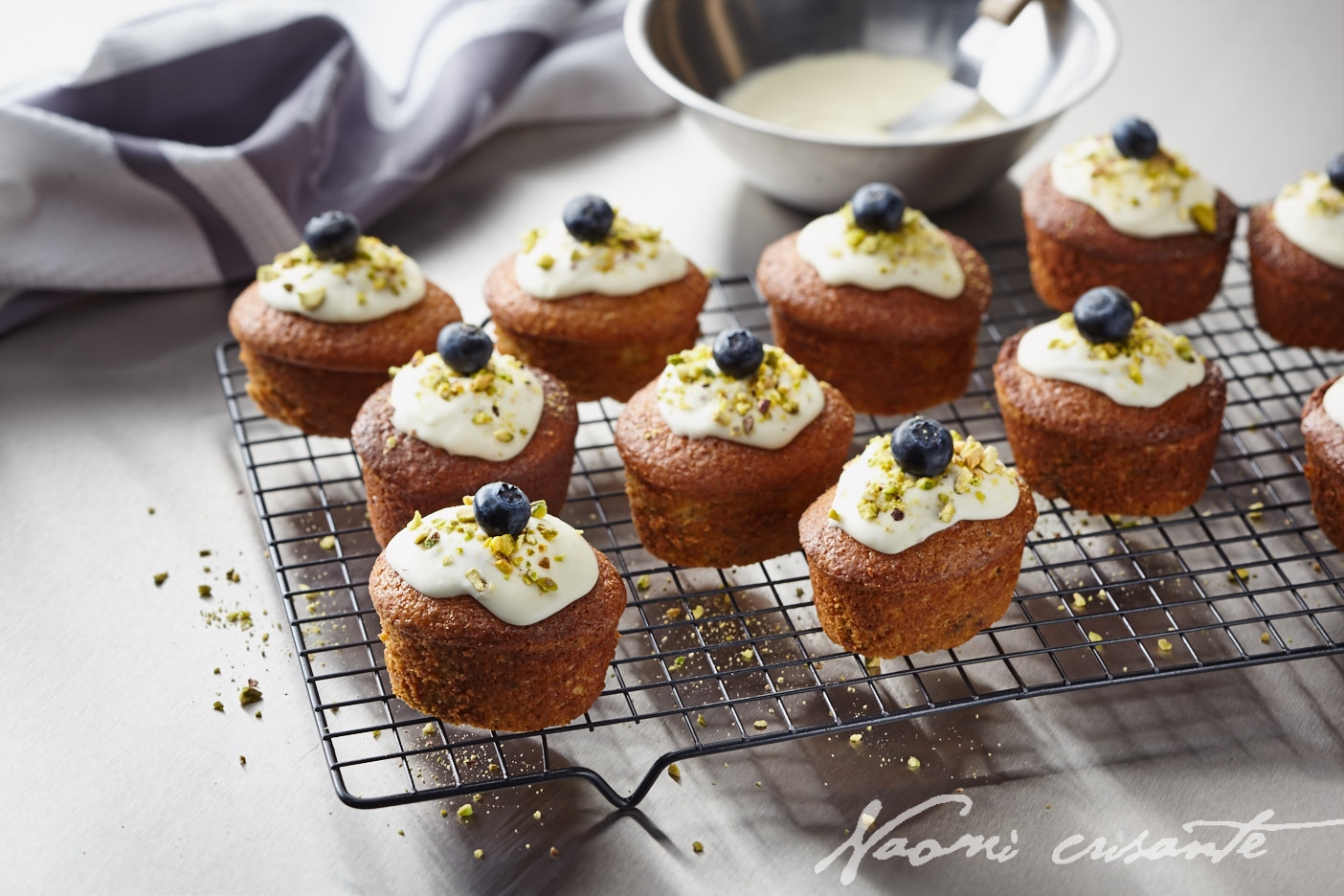 Pistachio and Blueberry Friands with Sour Cream Frosting