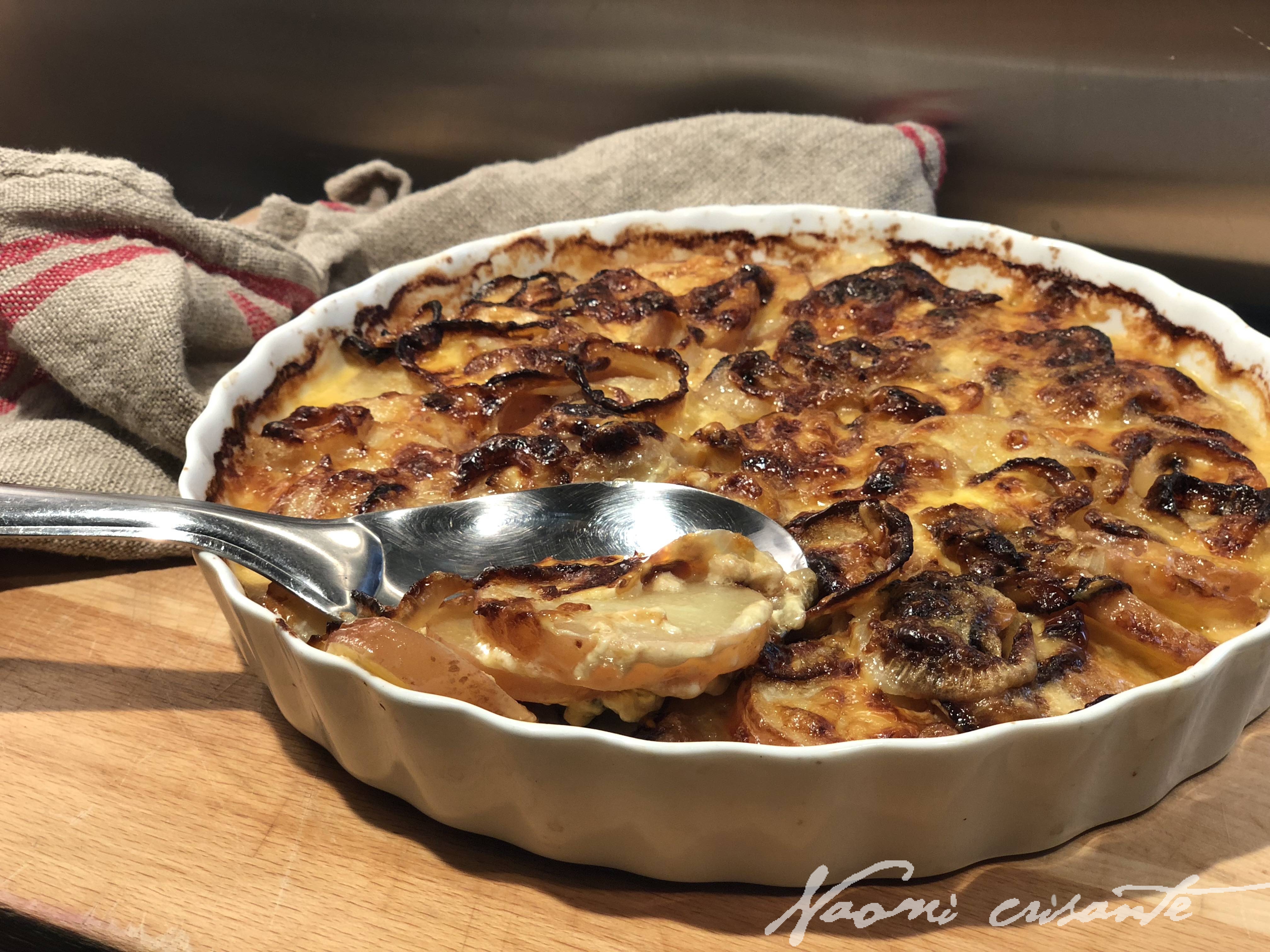 Scallopped Potatoes with Caramelised Onions and Smkoed Cheddar