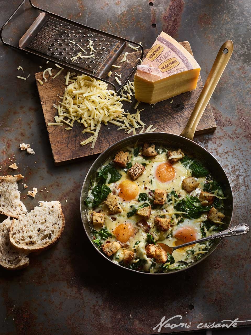 Spinach and Tilsit Baked Eggs with Croutons
