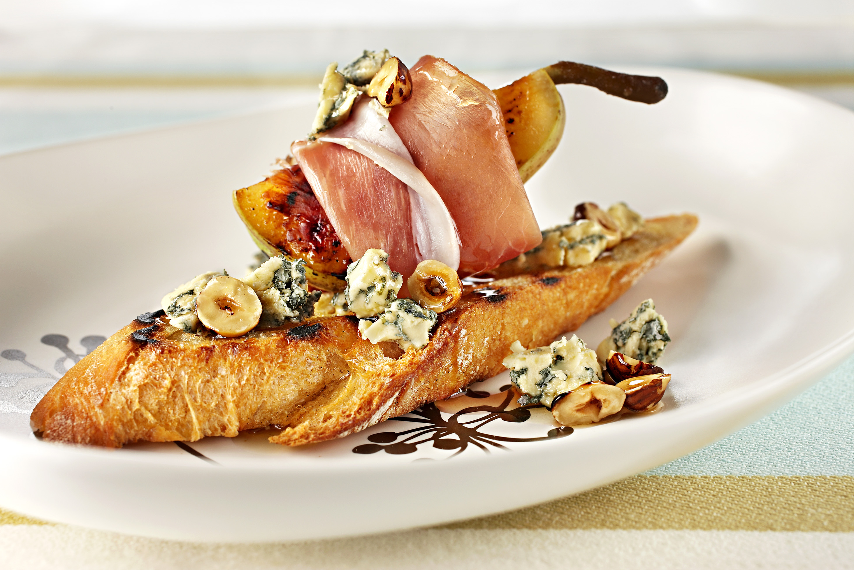 Char-grilled Pear, Prosciutto and Blue with Honeyed Hazelnuts